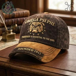 Omega Psi Phi 1911 Bulldog Distressed Baseball Cap in brown with embroidered gold lettering and bulldog mascot graphic.