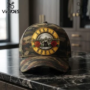 Guns N Roses Camouflage Embroidered Baseball Cap featuring the band's logo with revolvers and red roses on a camo pattern.