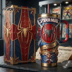 Spider-Man Marvel 64th Anniversary Stanley Tumbler with 3D embossed red and blue spider web design and gold trim.