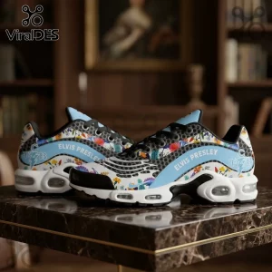 Elvis Presley Lightweight Casual Air Max Plus with floral pattern, light blue accents, and black mesh on a marble table.