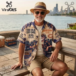 Chicago Bears Da Bears Tropical Hawaiian Shirt featuring blue palm trees, team logos, and text on a beige background.