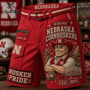 Nebraska Cornhuskers Mascot Red Casual Shorts featuring embroidered mascot, Husker Pride text, and team logos on red fabric.