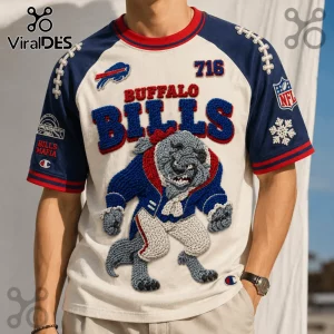Buffalo Bills NFL Embroidered Mascot Shirt featuring a 3D knit buffalo character, team logos, and text on a cream base.