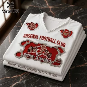 Arsenal Football Club Victoria Concordia Crescit shirt in white featuring distressed graphic prints and player imagery.