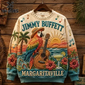 Jimmy Buffett Margaritaville embroidered sweater featuring a parrot, guitar, sunset, and palm trees on a beige knit fabric.