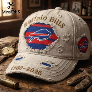 Buffalo Bills 1960-2026 Distressed Baseball Cap in beige with embroidered team logos and frayed fabric detailing.