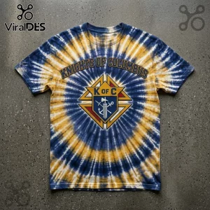 Knights of Columbus Premium Tie Dye T-Shirt with blue and gold swirl pattern and central K of C emblem on gray background.