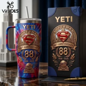 Superman 88th Anniversary Tie Dye 40oz Tumbler with red and blue swirl patterns and metallic gold anniversary emblem.