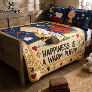 Snoopy Happiness Is A Warm Puppy Bedspread Quilt Set featuring Charlie Brown and Snoopy on a blue and cream background.