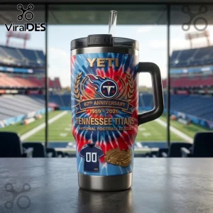 Tennessee Titans 67th Anniversary YETI Stanley Tumbler with red, white, and blue tie-dye pattern and team logo.