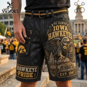 Iowa Hawkeyes Kinnick Stadium Casual Shorts in black denim featuring gold graphics of a hawk, football, and stadium.