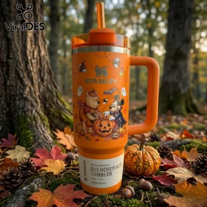 Disney Winnie the Pooh Mickey Mouse Halloween 40oz Tumbler in orange with autumn leaf background and carved pumpkin motifs.