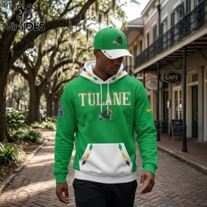 Tulane Green Wave 2026 City Edition Mardi Gras Hoodie worn with matching green and white cap in a New Orleans street.