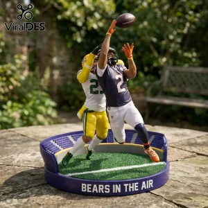 Chicago Bears Action Scene Christmas Ornament 2026 showing a football player leaping for a catch against a rival defender.