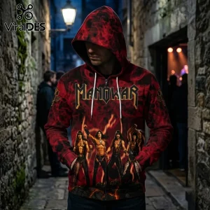 Manowar 2027 World Tour Red Flame Hoodie featuring a band graphic, fire motifs, and white drawstrings on a black base.