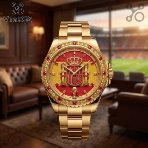 Spain National Football Team Gold Luxury Watch featuring a red dial, gold royal crest, and red stone-encrusted bezel.
