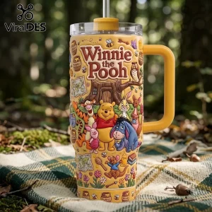 Winnie the Pooh Yellow 40oz Tumbler with Hundred Acre Wood characters including Tigger, Piglet, and Eeyore on a metal cup.