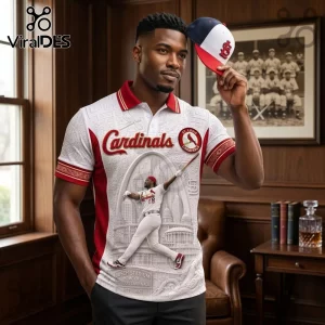 St. Louis Cardinals Busch Stadium white polo shirt with red collar, team logo, and baseball player graphics on front.