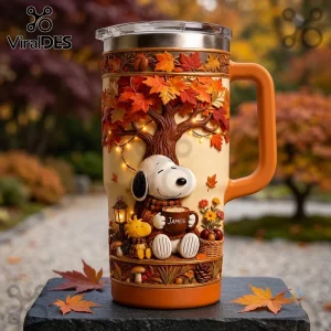 Snoopy Personalized Autumn Leaves Tumbler with 3D Snoopy and Woodstock under a fall tree, matte finish, orange base.