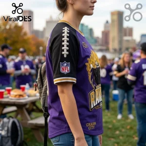 Maleficent x Baltimore Ravens embroidered purple shirt featuring black sleeves, football graphics, and team text detailing.