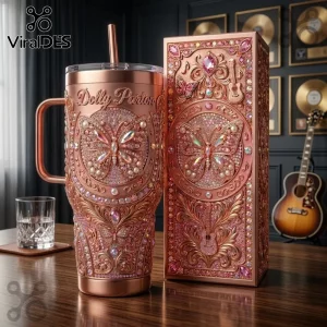Dolly Parton rose gold butterfly rhinestone Stanley tumbler with matching gift box featuring guitar and music motifs.