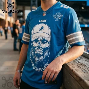 Detroit Lions Luke Combs 2027 Tour blue football jersey featuring a white graphic of a bearded skull wearing a ball cap.