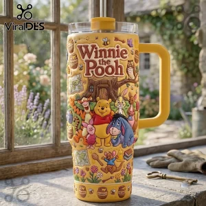 Winnie the Pooh Yellow 40oz Tumbler with 3D embossed characters, honey pots, and icons on a yellow insulated cup.