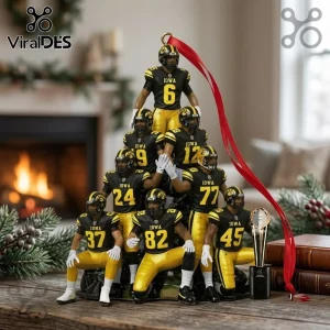 Iowa Hawkeyes Football Players 2026 Christmas Ornament featuring eight miniature players in team uniforms and a trophy.