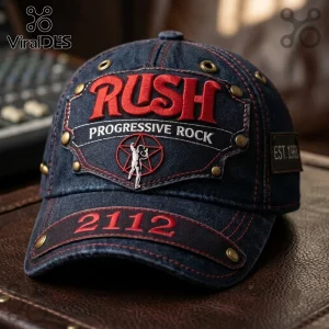 Rush 2112 Starman Distressed Denim Cap featuring red embroidery, brass rivets, and classic prog rock band logo details.
