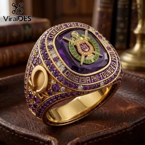 Omega Psi Phi Fraternity Premium Gold Ring featuring a large purple stone, crest emblem, and small accent stones.