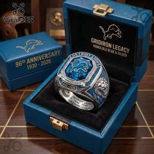Detroit Lions 96th Anniversary Blue Gem Ring featuring team logo, silver metallic accents, and inscribed 1930-2026 dates.
