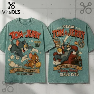 Tom and Jerry 1940 Partners in Crime T-Shirt featuring vintage animation graphics on a mineral-washed green fabric.