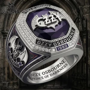 Ozzy Osbourne Prince of Darkness purple gemstone ring with silver bat emblem and diamond-studded accents on a gothic band.