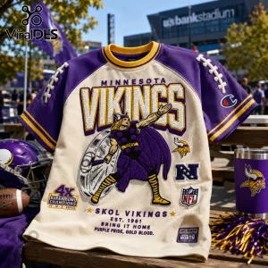Minnesota Vikings Embroidered Mascot Champion Shirt featuring purple and cream colors, Viking mascot graphic, and patches.