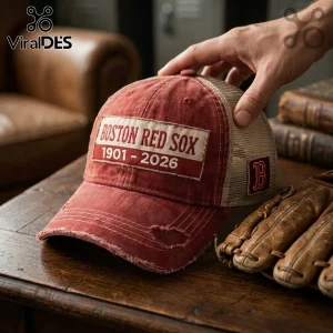 Boston Red Sox 125 Anniversary Distressed Cap featuring a vintage red cotton front and beige mesh back on a wooden table.