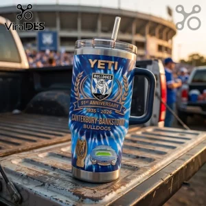 Canterbury-Bankstown Bulldogs 91st Anniversary Stanley Tumbler with blue tie-dye pattern on truck tailgate at stadium.