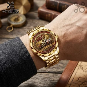 Indian Motorcycle 125th Anniversary gold tone quartz watch featuring a textured metal band and commemorative watch face.