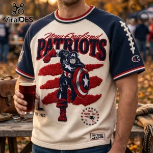 New England Patriots x Captain America Vintage Embroidered Shirt featuring blue raglan sleeves and textured red detailing.