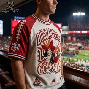 Tampa Bay Buccaneers 1976 Embossed Shirt featuring vintage graphics, red raglan sleeves, and a textured pirate logo.