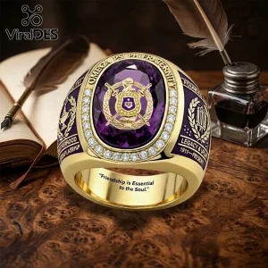 Omega Psi Phi Fraternity Embossed Ring with a large purple stone, gold band, crystal accents, and fraternity insignias.
