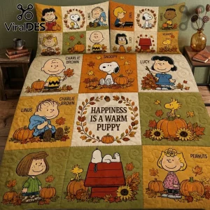 Peanuts Snoopy Autumn Pumpkin Quilt Set featuring Charlie Brown characters, autumn leaves, and pumpkins in a grid design.