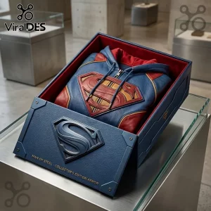 Superman Premium Leather Zip Up Hoodie folded inside a blue and red collector's box with a metallic S-shield emblem.