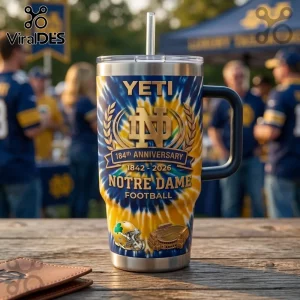 Notre Dame Fighting Irish 184th Anniversary Tumbler with blue and gold tie-dye pattern, logo, and stainless steel straw.