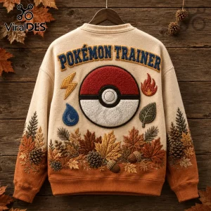 Pokemon Trainer Pikachu Autumn Knit Sweater with pokeball patch, elemental symbols, and embroidered fall foliage pattern.