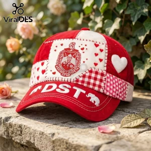 Delta Sigma Theta Patchwork Red Baseball Cap featuring the sorority crest, heart patterns, and an embroidered elephant logo.