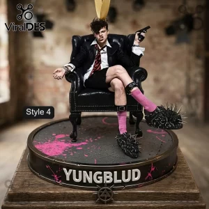Yungblud Limited Edition 2026 Christmas Ornament featuring the artist in a suit and spiked shoes on a circular base.