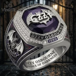 Ozzy Osbourne Prince of Darkness purple gemstone ring with silver bat motif, Ozzy logo, and inlaid diamond accents.