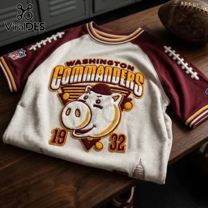 Washington Commanders Mascot Embossed Shirt with hog graphic, burgundy sleeves, and textured 1932 lettering on light gray.