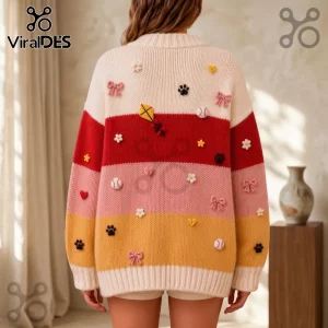 Peanuts Classic Comic Characters Embroidered Cardigan featuring red, pink, and yellow stripes with kite and ball motifs.