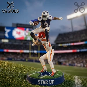 Dallas Cowboys 3D Sculpted Player Action Figure leaping over a Chiefs defender on a branded turf base at a stadium.